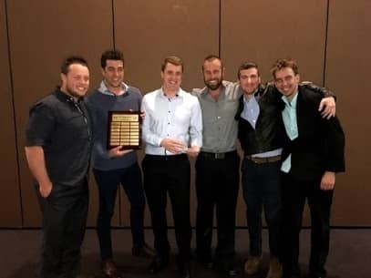 Water Tight Canberra takes a team photo during awards night